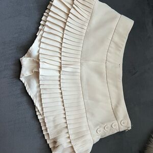 Edikted Cream Skirt with Pink Logo Tag